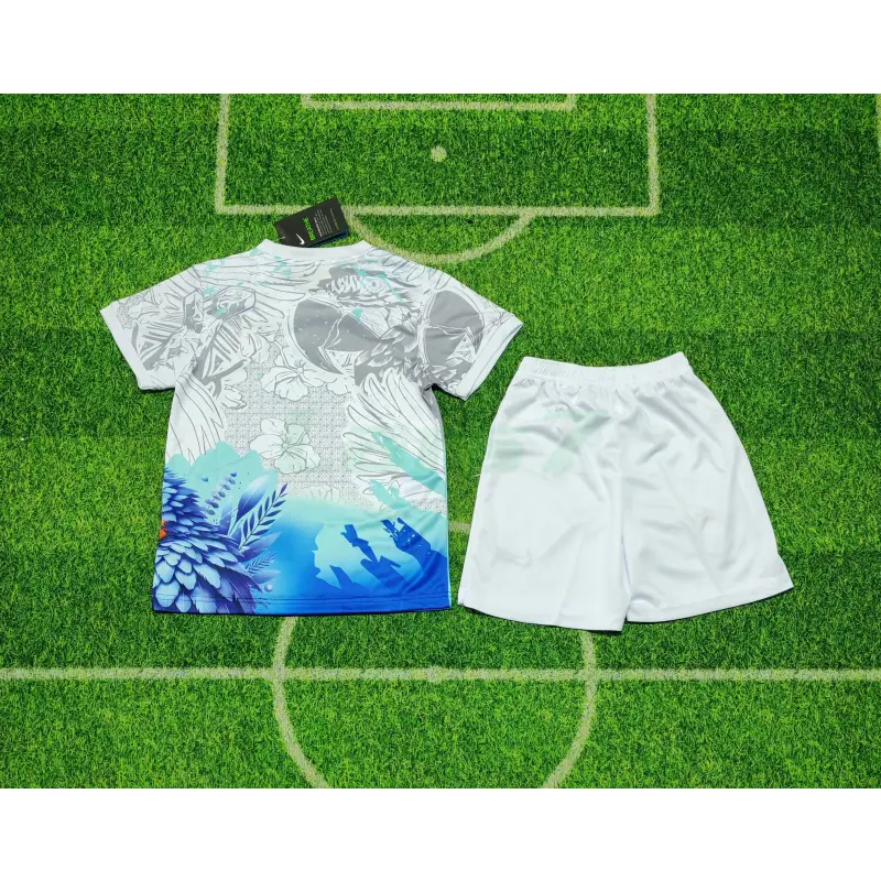 Camiseta Brasil 2026 Edición Especial con Estampado de Loro Blanco/Azul Niño Kit Camiseta Brasil 2026 Edición Especial con Estampado de Loro Blanco/Azul Niño Kit