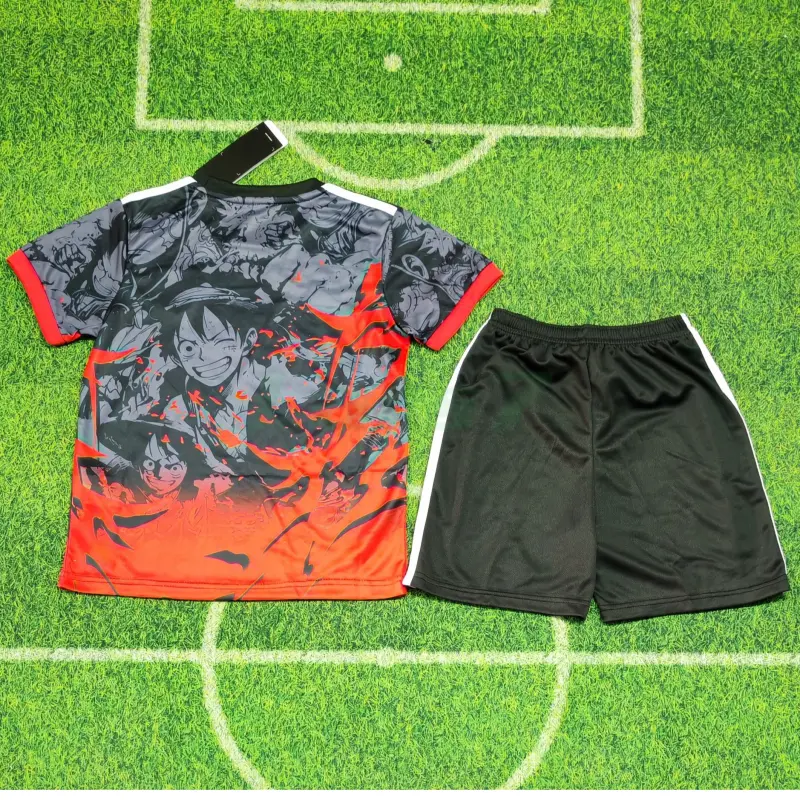 Camiseta Japón 2026 Edición Especial One Piece Negro/Rojo Niño Kit Camiseta Japón 2026 Edición Especial One Piece Negro/Rojo Niño Kit