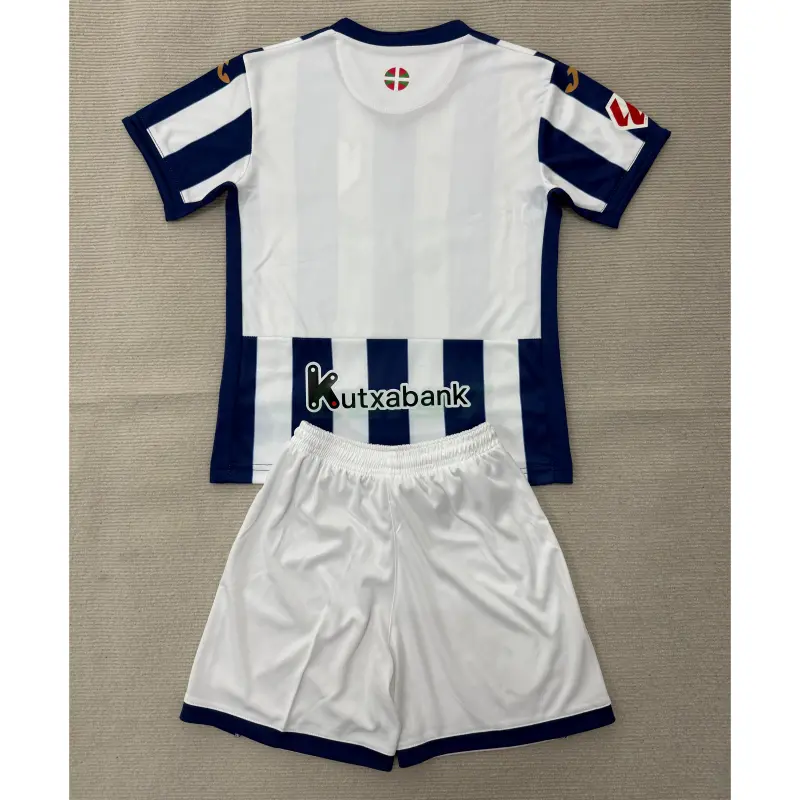 Camiseta Real Sociedad 1ª Equipación 2026/2027 Azul/Blanco Niño Kit con Parche La Liga
